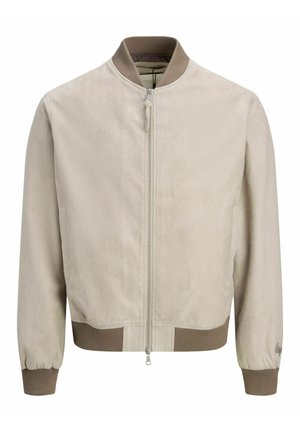 Vaaleanbeige bomber-takki, jossa on tummemman beigenväriset resorit hihansuissa, kauluksessa ja helmassa, etumuksessa vetoketju ja hillitty hihansuun kirjailu.