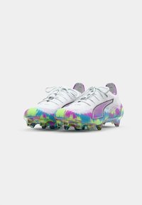 White soccer cleats with a colorful tie-dye pattern in green, pink, and blue. Features a textured upper and a translucent sole.