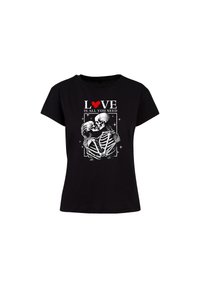 Black short-sleeve t-shirt featuring a graphic print of two skeletons kissing, with the text "LOVE IS ALL YOU NEED" in white and red.