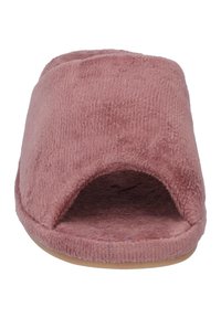 Roze, fuzzy instappers van textielmateriaal met een open teen ontwerp en een zachte binnenvoering. Platte zool voor comfort.