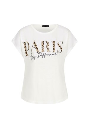 White T-shirt with a loose fit, featuring "PARIS" in leopard print and "Stay Different" in black cursive. Soft, lightweight material.