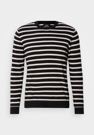 Sweater de riscas pretas e brancas feito de tecido de malha macia. Apresenta um decote redondo e punhos e bainha canelados. Design simples e clássico.