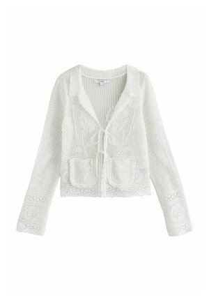 Baltas nėrimo megztinis su ilgomis rankovėmis, priekiniu užsegamų kišenių, surišamu uždarymu ir gėlių rašto detalėmis.