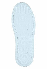 Witte rubberen schoenzool met een textuur van grippatronen, gekenmerkt door diamantvormen. Branding en "Made in Slovenia" zijn in de oppervlakte geperst.