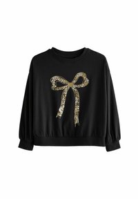 Svart sweatshirt med långa ärmar och rundad halsringning, prydd med en guld- och rhinestones-bowgrafik på framsidan och elastisk nederkant.