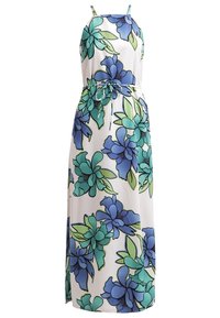 Robe maxi blanche sans manches avec un grand motif floral bleu et vert et une fine ceinture à nouer à la taille.
