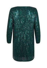 Grön paljett-topp med långa ärmar, med ett strukturerat vågmönster. Materialet reflekterar ljus och skapar en skimrande effekt.