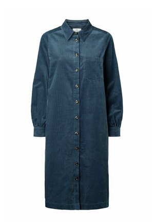 Tengerészkék kordbársony ingruha galléros nyakkivágással, elöl gombos záródással, hosszú ujjakkal és mellzsebbel. Függőleges bordázott textúra.