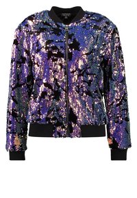 Veste bomber à sequins avec une base en tissu noir, présentant un motif multicolore en violet, bleu et vert. Dispose de poignets et d'un ourlet côtelés.