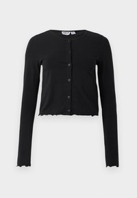 Cardigan scurt negru din material moale, cu mâneci lungi, decolteu rotund și cinci nasturi pe partea din față. Marginile sunt decorate cu un design ondulat.