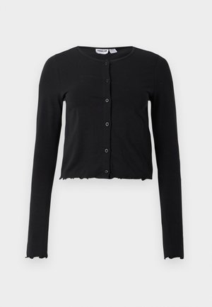Black cropped cardigan made of soft fabric with long sleeves, a round neckline, and five button closures along the front. Edged with a scalloped design.