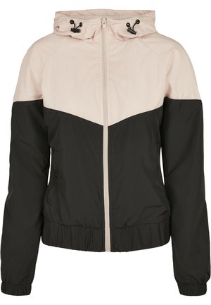 Zwarte en lichtroze zip-up jack met een capuchon, met raglanmouwen, elastische boorden en zoom, en een contrasterend kleurblokontwerp.