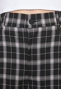 YOURTURN Tygbyxor - black