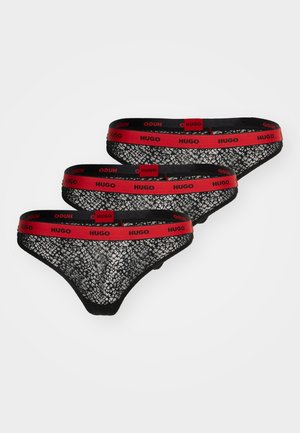 Conjunto de calcinhas fio dental em renda preta, com um cós elástico vermelho com o logótipo "HUGO". Material leve com um padrão texturizado. Três peças.