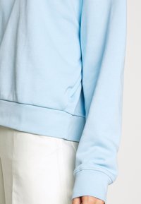 Weekday Mikina - light blue