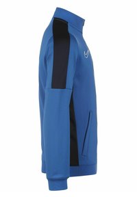 Blauwe Nike-jack met een hoge kraag, zwarte zijpanelen, twee zijzakken en geribbelde cuffs. Glad materiaal met een strakke, atletische uitstraling.