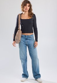 America Today RELAXED FIT - Straight leg jeans - medium used