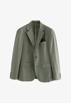 Oliivroheline bleiser, millel on narmastikudu, kaks esist pihku ja üksik nupp. Must tasku nelk. Sujuv tekstuur.