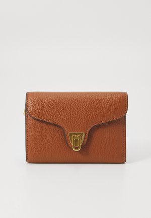 Brown leather wallet with a grainy texture, a gold metal clasp, and an envelope-style flap. Edges are neatly stitched.