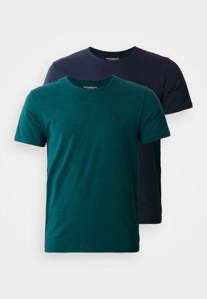 Two crew neck t-shirts, one teal and one dark navy, both made of cotton, featuring short sleeves and a subtle logo on the chest.