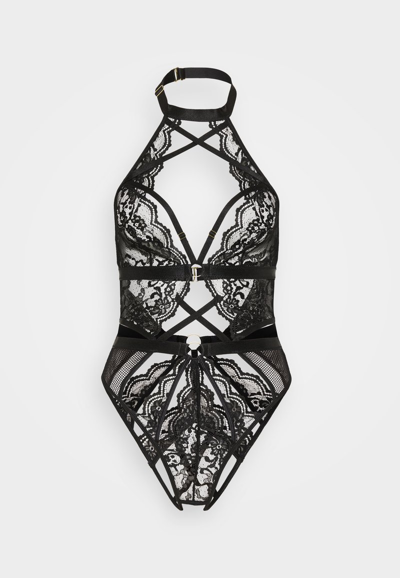 Body de encaje negro con cuello halter, tirantes cruzados y secciones transparentes. Incluye detalles de metal dorado y patrones intrincados de encaje.
