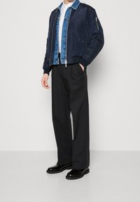 Calvin Klein Kalhoty - black