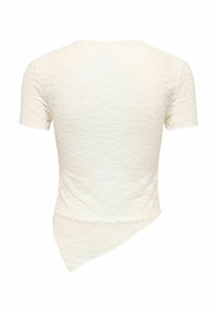 Top blanc en dentelle à manches courtes avec un ourlet asymétrique, montrant une texture de dentelle florale, présenté de dos.