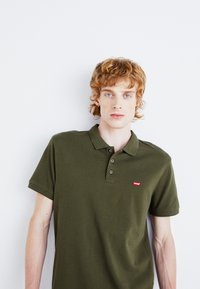 Levi's® Polo majica - olive night