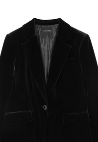 Blazer en velours noir avec un col cranté, fermeture à un bouton et deux poches avant. Doublé avec un tissu à motifs.