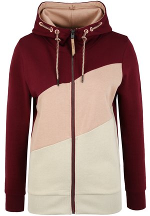 Mørkerød og lys beige zip-up hættetrøje med et trekantet farveblokdesign. Har snoretræk, blød tekstur og ribbede manchetter og kant.