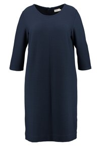Robe bleu marine en tissu texturé, décolleté rond et manches trois-quarts. Dispose d'une fermeture éclair discr�ète au dos et d'un design à la hauteur du genou.