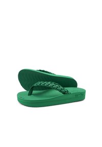 Green flip-flops with a braided strap design, made of rubber material, featuring a textured sole for grip and a flat, flexible structure.