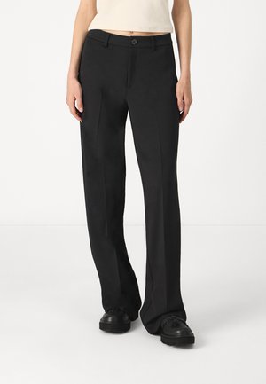 Black tailored trousers made of a smooth fabric, featuring a straight fit, single button closure, and front pleats.