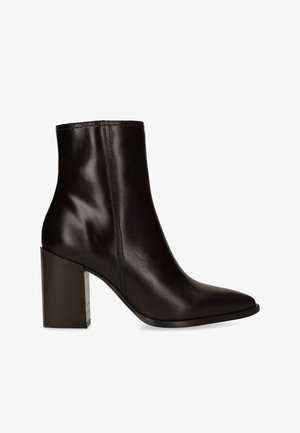 Dark brown leather ankle boot with block heel and pointed toe, side view on a white background.
