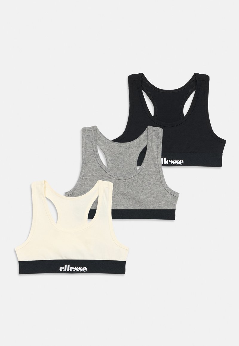 Τρία αθλητικά σουτιέν racerback σε μαύρο, γκρι και κρεμ, το καθένα με μαύρη ταινία και λευκό λογότυπο "ellesse" στο μπροστινό μέρος.
