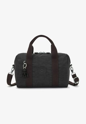 Sac à main en tissu noir avec des anses en toile marron et une bandoulière, fermeture éclair, finition texturée, patch logo et détail de porte-clés.