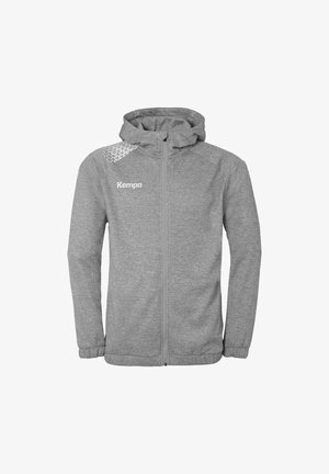 Gray zip-up jacket made of soft fabric. Features a hood, elastic cuffs, and a geometric pattern on one shoulder. Kempa logo on the chest.