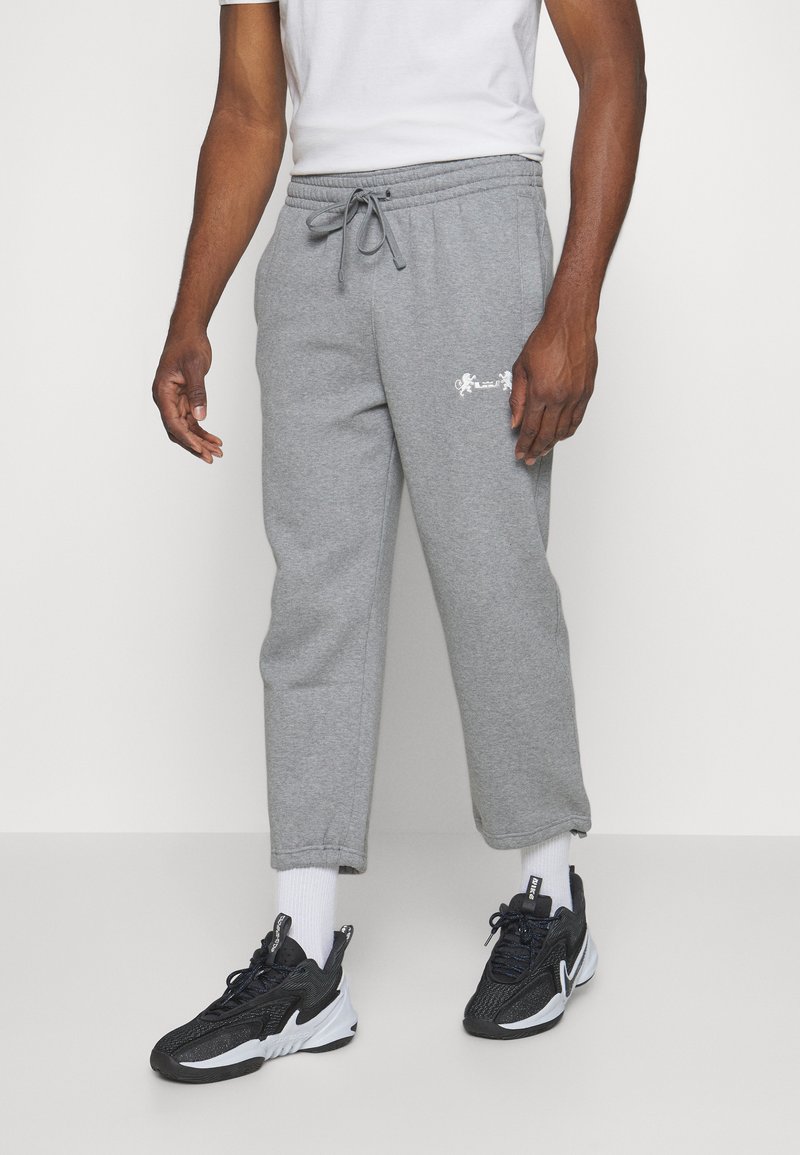 Nike Performance OPEN HEM Tracksuit bottoms carbon heather/phantom