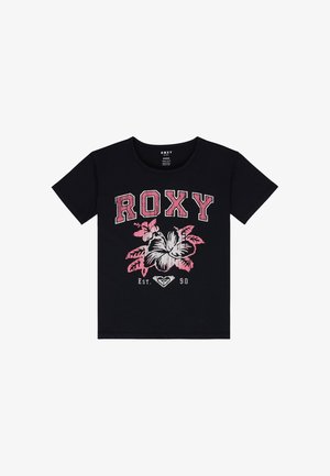 T-shirt noir avec "ROXY" en lettres roses en gras, un graphique d'hibiscus et "Est. 90" en dessous, sur fond blanc uni.