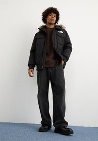 The North Face MCMURDO  - Jachetă cu puf - black