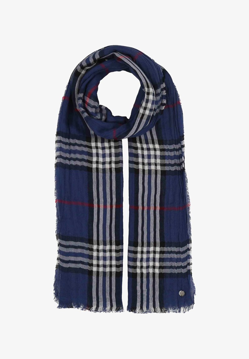 Écharpe bleu marine avec motif à carreaux blanc, noir et rouge, tissu léger et bords effilochés, pliée en boucle.