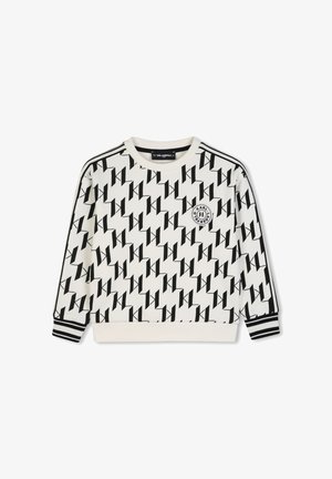 Hvid langærmet sweatshirt med sort diagonalt "K" mønster, sort-hvide stribede manchetter og en rund logo-mærkat på venstre bryst.