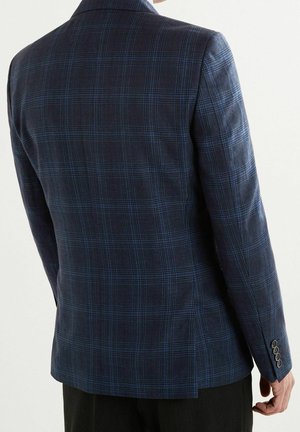 Marine-karo Blazer mit blauen Akzenten, strukturierter Design, spitzes Revers und vier-Knopf-Manschetten. Glattes Gewebe mit taillierter Passform.