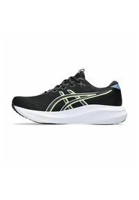 Chaussure de course noire avec semelle blanche, accents vert néon et gris, et languette bleue à l'arrière, présentée en profil latéral sur fond blanc.