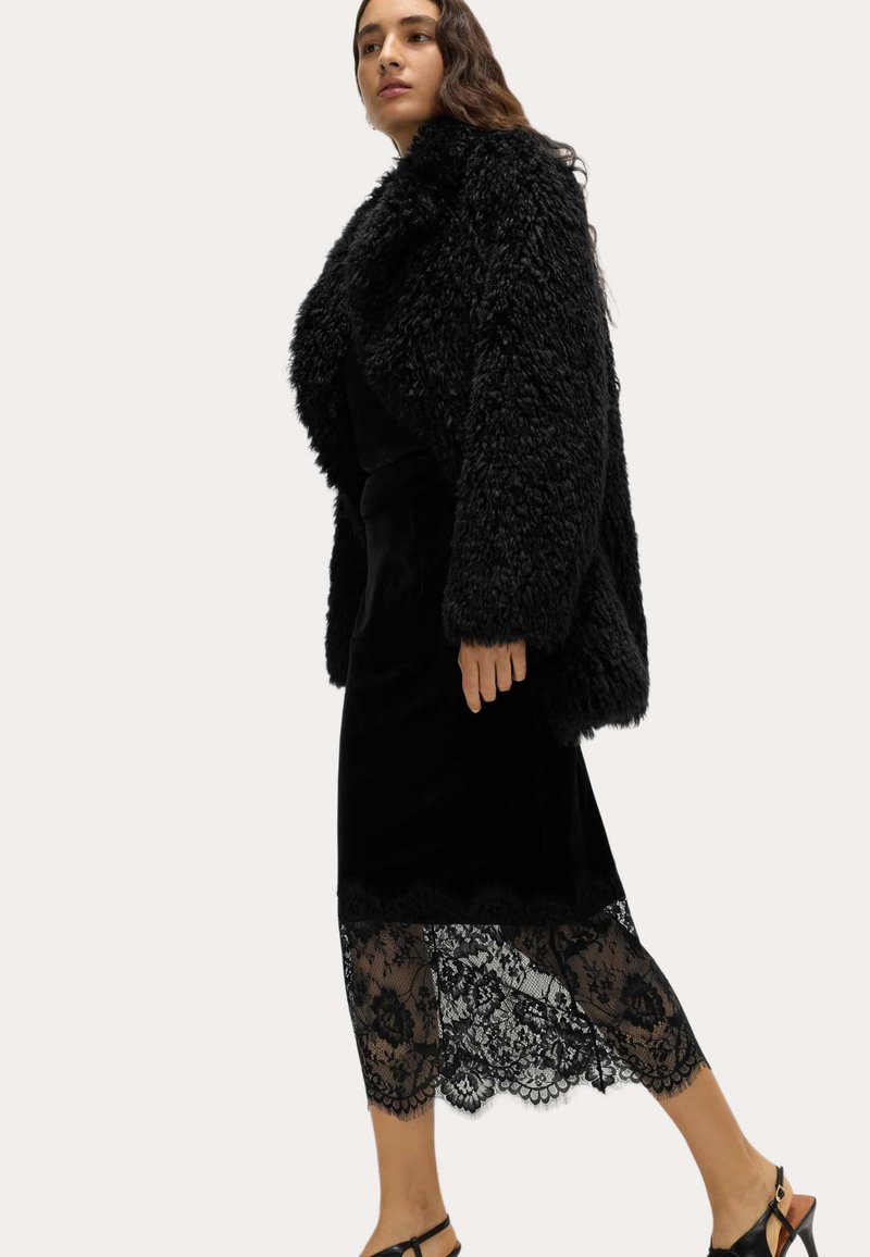 Jupes Femmes - en Satin noir pour élégantes - FR34Bl Black