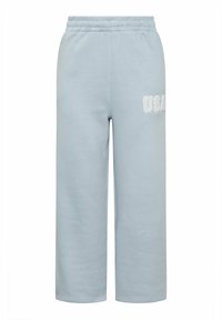 Ljust blå träningsbyxor med en mjuk textur, elastisk midja och broderad "USA"-logotyp på vänster lår. Rakt ben-design.