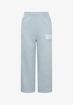 Pantaloni della tuta azzurri chiari con una texture morbida, vita elastica e logo ricamato "USA" sulla coscia sinistra. Design a gamba dritta.