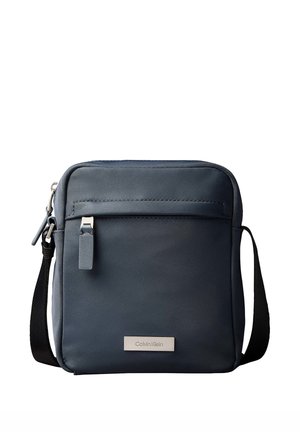 Calvin Klein REPORTER granatowy