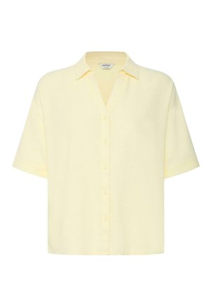 Ανοιχτό κίτρινο πουκάμισο με κοντά μανίκια, κουμπιά και γιακά, σε χαλαρή εφαρμογή, εμφανίζεται σε λευκό φόντο.