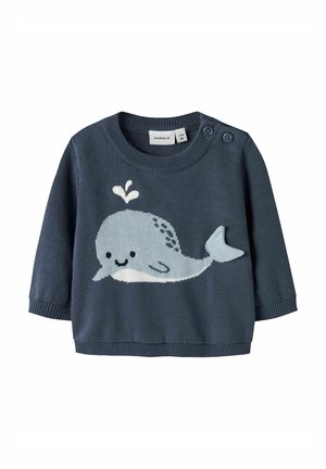Pull bébé bleu marine à manches longues, boutons sur l'épaule, avec un motif de baleine souriante bleu clair soufflant de l'eau sur le devant.